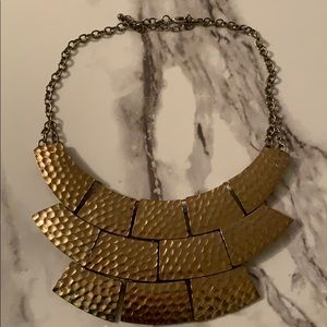 Gold hammered metal necklace